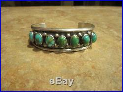 Vintage NAVAJO Sterling Silver CARICO LAKE Turquoise ROW Cuff Bracelet
