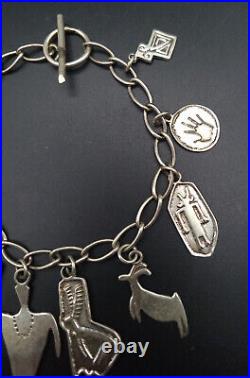 Vintage Native American Sterling Silver Charm Bracelet 8 Ray Tracey Knife Wing