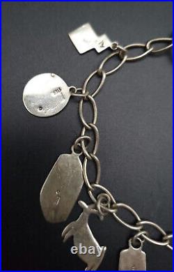 Vintage Native American Sterling Silver Charm Bracelet 8 Ray Tracey Knife Wing