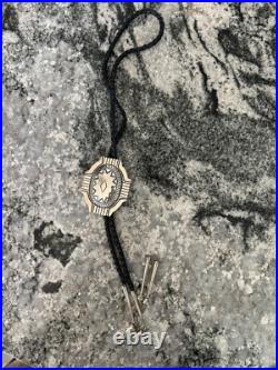 Vintage Native American Sterling Silver Hand Stamped Domed Councho Bolo Tie