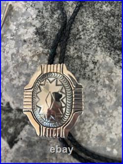 Vintage Native American Sterling Silver Hand Stamped Domed Councho Bolo Tie
