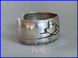 Vintage Navajo Sterling Silver Storyteller Bracelet Signed DM Vintage Navajo Sterling Silver Storyteller Bracelet Signed DM