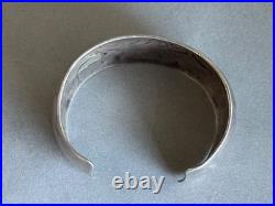 Vintage Navajo Sterling Silver Storyteller Bracelet Signed DM Vintage Navajo Sterling Silver Storyteller Bracelet Signed DM